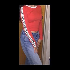 Red long sleeve (slightly) cropped top. Worn once.